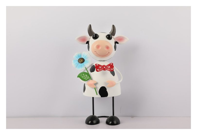 Cow farm figure with flower